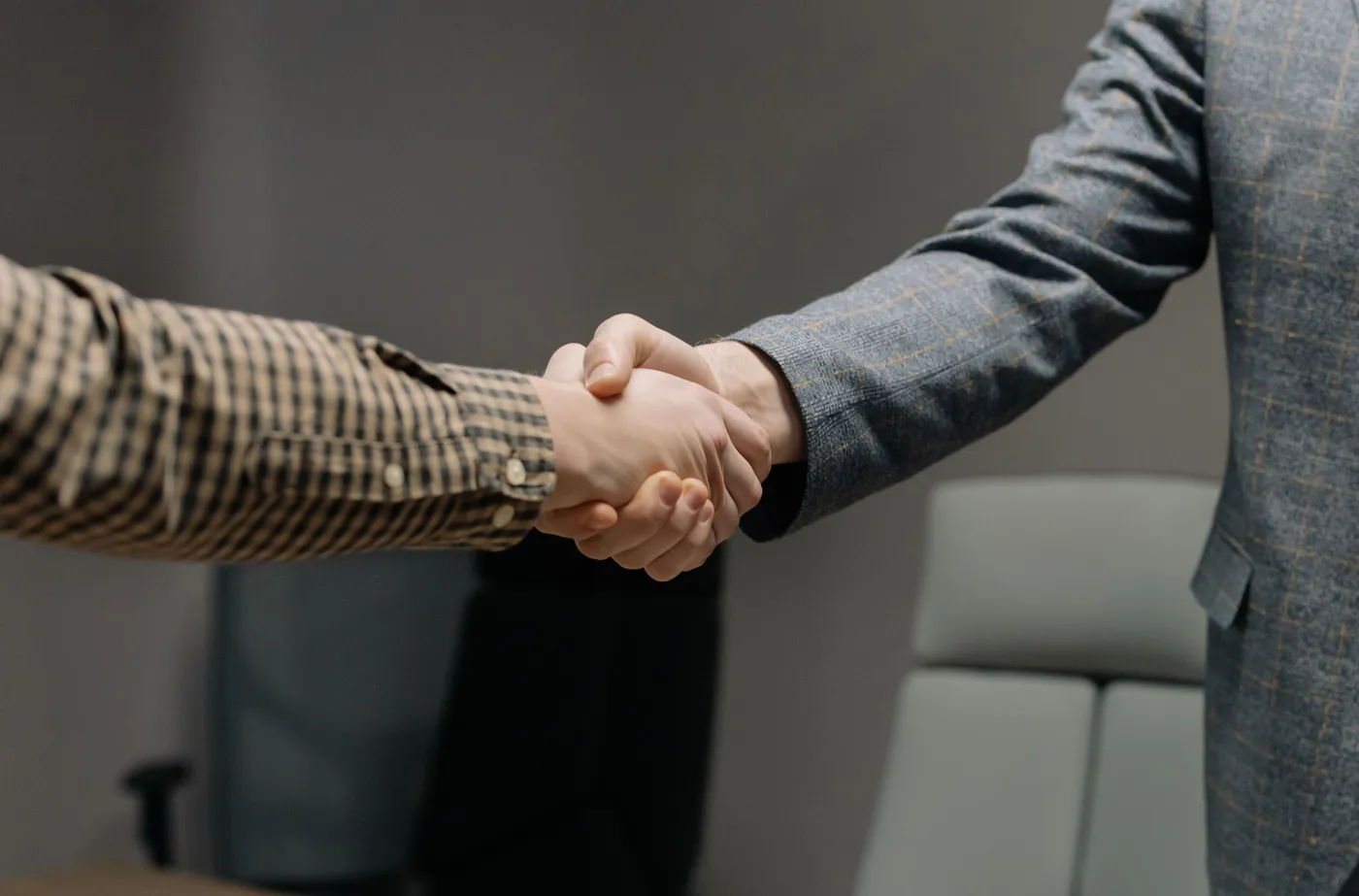A handshake between partners